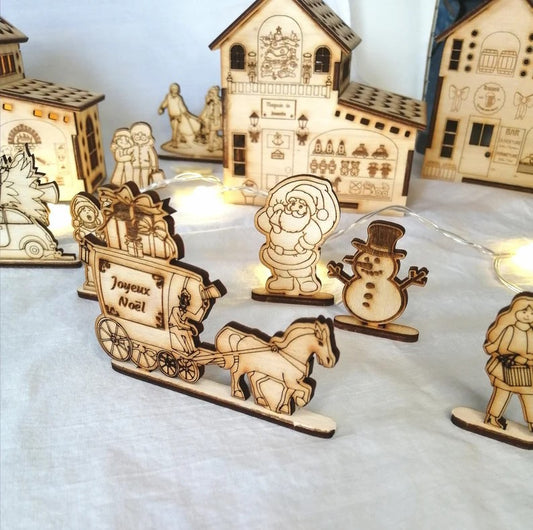 Personnages en bois pour village de noël